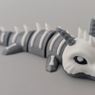 3D printed articulated bone dragon keychain figure