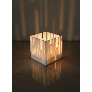 3D printed Citycube candle holder glowing with tea candle inside