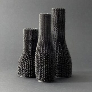 3D printed loop-textured vase trio in dark grey