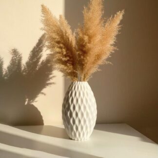 3D printed white faceted diamond-textured vase with pampas grass