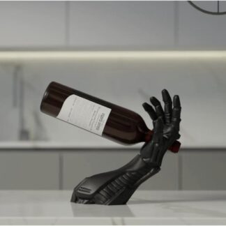Robopour cyborg arm wine holder gripping a wine bottle