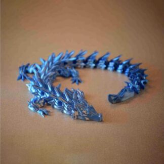 3D printed articulated water dragon toy in blue